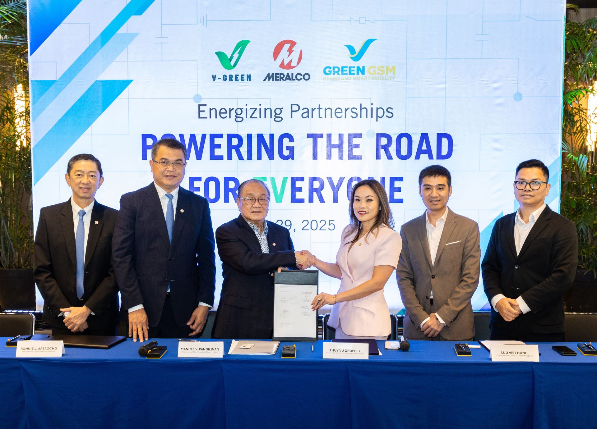 Representatives of V-Green, Green GSM Philippines, and Meralco at the signing ceremony